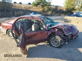 2000 Buick Regal GS with VIN 2G4WF5516Y1270238, listed as a Copart auction lot 77693904 with 0 mi miles and Salvage Title. Bid and sale history available at carsss.com. Image 4.