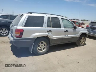 2002 Jeep Grand Cherokee Laredo with VIN 1J4GW48S52C242434, listed as a Copart auction lot 62859835 with 171,342 mi miles and Clean title. Bid and sale history available at DreamBid. Image 3.