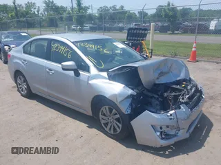 2016 Subaru Impreza Premium with VIN JF1GJAB64GH006713, listed as a IAAI auction lot 42399156 with 106,030 mi miles and . Bid and sale history available at DreamBid. Image 1.