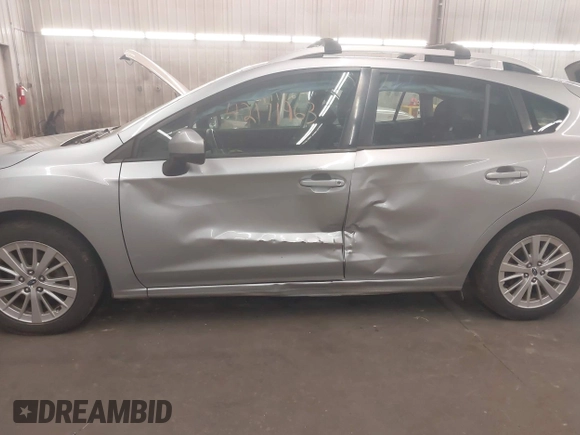 2017 Subaru Impreza Premium with VIN 4S3GTAB67H3740524, listed as a IAAI auction lot 42171963 with 148,495 mi miles and . Bid and sale history available at DreamBid. Image 6.