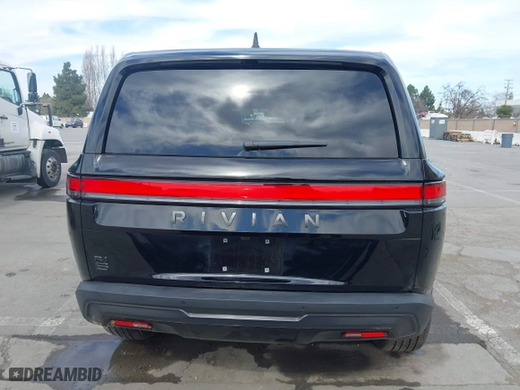 2025 Rivian R1S Adventure with VIN 7PDSGBBA5SN055497, listed as a IAAI auction lot 41695600 with 5,387 mi miles. Bid and sale history available at carsss.com. Image 17.