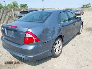 2012 Ford Fusion SE with VIN 3FAHP0HA0CR203704, listed as a IAAI auction lot 42487848 with 169,897 mi miles and . Bid and sale history available at DreamBid. Image 4.