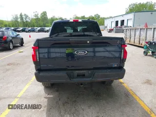 2023 Ford F-150 Lightning Pro with VIN 1FTVW1EL6PWG30061, listed as a IAAI auction lot 42362295 with 22,481 mi miles and . Bid and sale history available at DreamBid. Image 16.