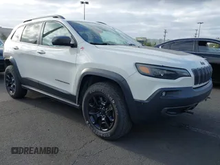 2019 Jeep Cherokee Trailhawk with VIN 1C4PJMBX0KD227083, listed as a IAAI auction lot 42120076 with 118,431 mi miles and . Bid and sale history available at DreamBid. Image 1.