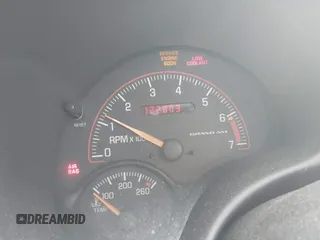 2004 Pontiac Grand Am GT z VIN 1G2NW52E94C107860, wystawiony jako IAAI lot #42241126 z przebiegiem 122 803 mil mil oraz . Historia ofert i sprzedaży dostępna na DreamBid. Obrazek 7.