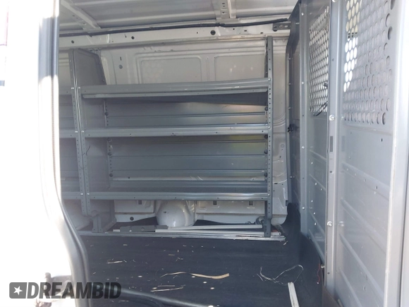 2014 Ford Econoline Cargo Commercial with VIN 1FTNE2EW3EDA18900, listed as a IAAI auction lot 41209002 with 138,014 mi miles and . Bid and sale history available at carsss.com. Image 8.