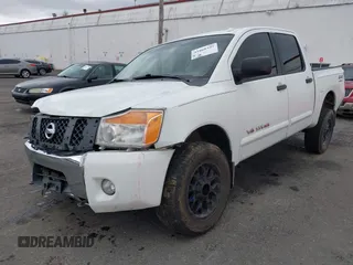 2013 Nissan Titan PRO-4X with VIN 1N6BA0EC9DN301669, listed as a IAAI auction lot 41868397 with 171,085 mi miles. Bid and sale history available at carsss.com. Image 18.
