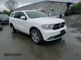 2014 Dodge Durango Limited z VIN 1C4RDJDGXEC593042, wystawiony jako Copart lot #56348355 z przebiegiem 162 094 mil mil oraz Szkoda całkowita • Salvage title. Historia ofert i sprzedaży dostępna na DreamBid. Obrazek 14.
