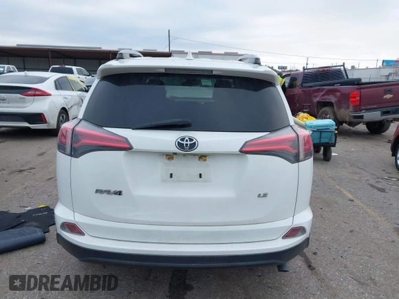 2017 Toyota RAV4 LE with VIN JTMZFREV1HJ103223, listed as a IAAI auction lot 41571466 with 96,860 mi miles and . Bid and sale history available at carsss.com. Image 16.