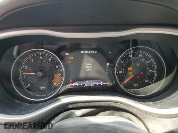 2015 Jeep Cherokee Trailhawk with VIN 1C4PJMBS8FW717950, listed as a Copart auction lot 60321625 with 155,210 mi miles and Salvage title. Bid and sale history available at DreamBid. Image 9.