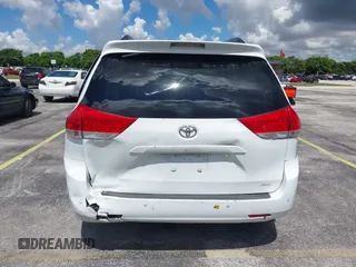 2014 Toyota Sienna XLE with VIN 5TDYK3DC4ES414728, listed as a IAAI auction lot 42588916 with 291,007 mi miles and . Bid and sale history available at DreamBid. Image 16.