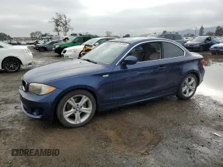 2012 BMW 1 Series 128i with VIN WBAUP7C58CVP23824, listed as a Copart auction lot 85581654 with 81,587 mi miles and Salvage title. Bid and sale history available at DreamBid. Image 1.