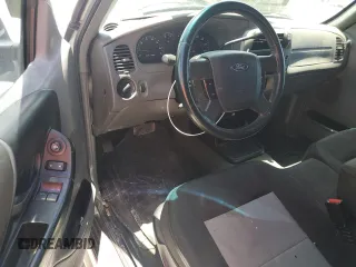 2009 Ford Ranger XL z VIN 1FTYR15E99PA60348, wystawiony jako Copart lot #60277425 z przebiegiem 141 157 mil mil oraz Szkoda całkowita • Salvage title. Historia ofert i sprzedaży dostępna na DreamBid. Obrazek 8.