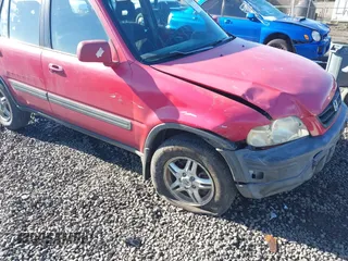 2000 Honda CR-V EX with VIN JHLRD1863YC051709, listed as a IAAI auction lot 41678500 with 197,313 mi miles. Bid and sale history available at carsss.com. Image 6.