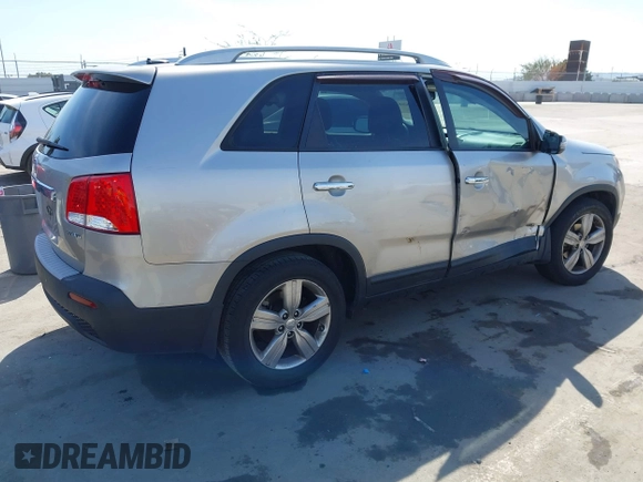 2013 Kia Sorento EX with VIN 5XYKU4A20DG412133, listed as a IAAI auction lot 41826871 with 76,233 mi miles and . Bid and sale history available at carsss.com. Image 4.