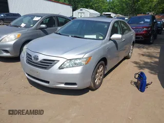 2007 Toyota Camry with VIN 4T1BB46KX7U020015, listed as a IAAI auction lot 42411157 with 256,430 mi miles and . Bid and sale history available at DreamBid. Image 2.