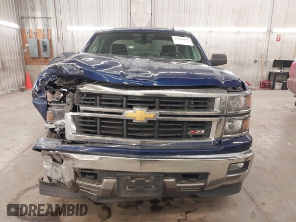 2014 Chevrolet Silverado 1500 LT with VIN 1GCVKREC2EZ155062, listed as a IAAI auction lot 41260471 with 135,762 mi miles and . Bid and sale history available at DreamBid. Image 13.