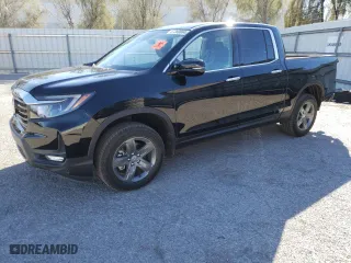 2023 Honda Ridgeline RTL-E with VIN 5FPYK3F75PB044789, listed as a Copart auction lot 87380884 with NaN miles and Salvage Title. Bid and sale history available at carsss.com. Image 1.