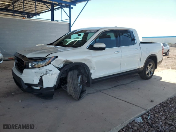 2022 Honda Ridgeline RTL-E with VIN 5FPYK3F76NB015489, listed as a Copart auction lot 52457795 with 35,730 mi miles and Salvage Title. Bid and sale history available at carsss.com. Image 1.