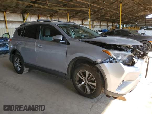 2018 Toyota RAV4 XLE with VIN JTMRFREV1JJ213808, listed as a Copart auction lot 54437805 with 56,972 mi miles and Salvage Title. Bid and sale history available at DreamBid. Image 4.