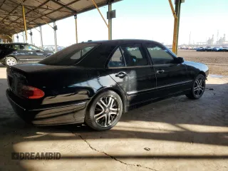 2000 Mercedes-Benz E with VIN WDBJF70G3YA960670, listed as a Copart auction lot 85757784 with Not Provided miles and Salvage Title. Bid and sale history available at DreamBid. Image 3.