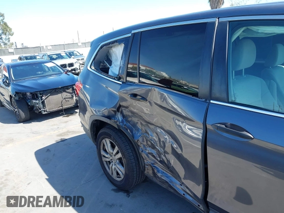 2016 Honda Pilot LX with VIN 5FNYF5H1XGB032851, listed as a IAAI auction lot 41998989 with 68,882 mi miles and . Bid and sale history available at DreamBid. Image 6.