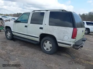 1996 Chevrolet Tahoe with VIN 1GNEK13R9TJ409605, listed as a IAAI auction lot 41467333 with 209,356 mi miles. Bid and sale history available at carsss.com. Image 3.