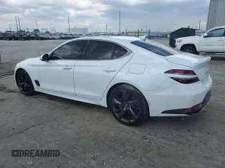 2022 Genesis G70 3.3T with VIN KMTG54TE7NU100743, listed as a Copart auction lot 71376494 with 23,561 mi miles and Salvage Title. Bid and sale history available at carsss.com. Image 2.