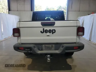 2022 Jeep Gladiator Sport S with VIN 1C6JJTAG9NL176055, listed as a Copart auction lot 83069084 with 53,752 mi miles and Salvage title. Bid and sale history available at DreamBid. Image 6.