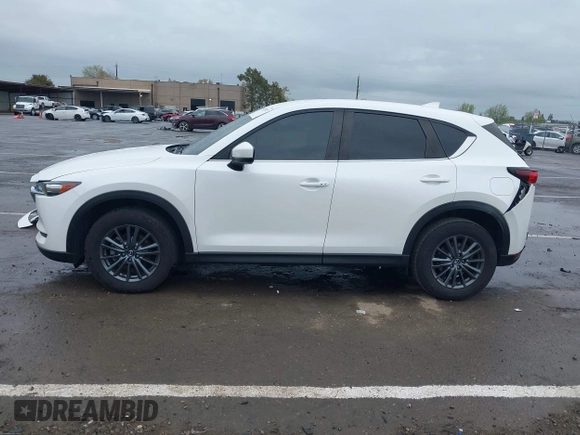 2020 Mazda CX-5 Touring with VIN JM3KFACM0L0738615, listed as a IAAI auction lot 41923923 with 52,599 mi miles. Bid and sale history available at carsss.com. Image 15.