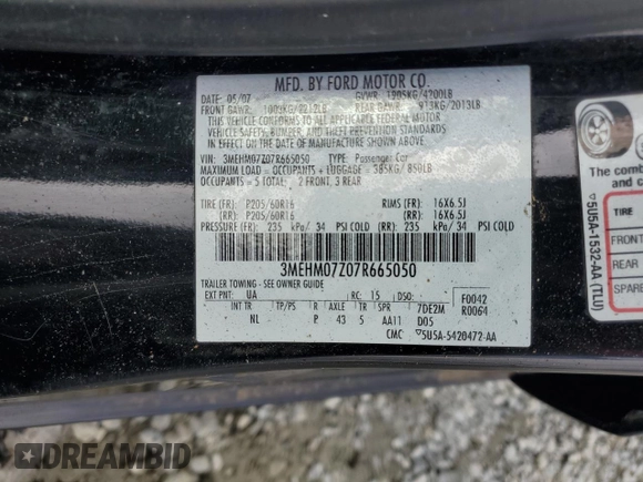 2007 Mercury Milan with VIN 3MEHM07Z07R665050, listed as a Copart auction lot 71824814 with 112,677 mi miles and Salvage Title. Bid and sale history available at carsss.com. Image 14.