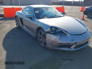 2017 Porsche 718 Cayman z VIN WP0AA2A80HS270427, wystawiony jako IAAI lot #41826271 z przebiegiem 60 199 mil mil oraz . Historia ofert i sprzedaży dostępna na DreamBid. Obrazek 1.