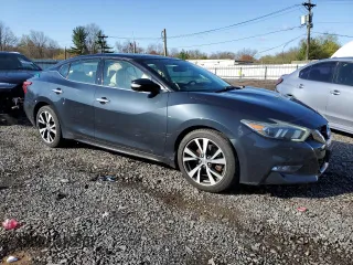 2016 Nissan Maxima SV with VIN 1N4AA6AP2GC434063, listed as a Copart auction lot 52179995 with 106,761 mi miles and Salvage Title. Bid and sale history available at carsss.com. Image 4.