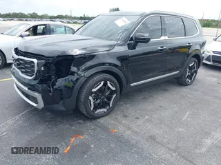 2025 Kia Telluride S with VIN 5XYP6DGC8SG590319, listed as a IAAI auction lot 42625086 with 14,392 mi miles and . Bid and sale history available at DreamBid. Image 2.