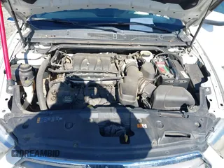 2013 Ford Taurus SEL with VIN 1FAHP2E87DG221557, listed as a IAAI auction lot 41331531 with 152,879 mi miles. Bid and sale history available at carsss.com. Image 10.