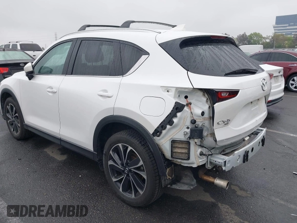 2022 Mazda CX-5 S Premium Plus with VIN JM3KFBEM6N0615083, listed as a IAAI auction lot 41907406 with 49,617 mi miles and . Bid and sale history available at carsss.com. Image 3.