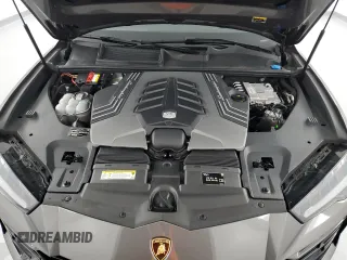 2022 Lamborghini Urus z VIN ZPBUA1ZLXNLA16447, wystawiony jako Copart lot #69403664 z przebiegiem 28 166 mil mil oraz Szkody całkowita. Historia ofert i sprzedaży dostępna na DreamBid. Obrazek 12.
