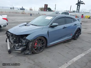 2019 Honda Civic Type R Touring with VIN SHHFK8G7XKU204670, listed as a IAAI auction lot 38843824 with 57,195 mi miles. Bid and sale history available at carsss.com. Image 18.