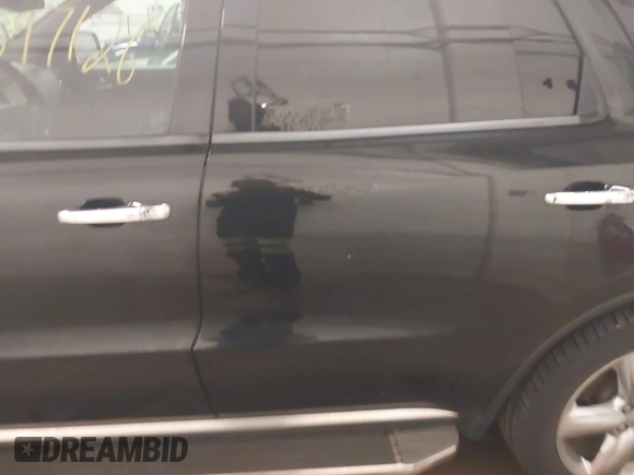 2013 Dodge Durango Citadel with VIN 1C4SDJET9DC661861, listed as a IAAI auction lot 42597126 with 187,631 mi miles and . Bid and sale history available at DreamBid. Image 14.