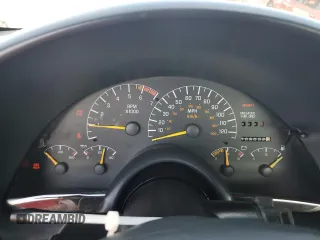 1996 Pontiac Firebird Firebird z VIN 2G2FS22KXT2220333, wystawiony jako Copart lot #77640324 z przebiegiem 89 032 mil mil oraz Nie do naprawy • Non repairable. Historia ofert i sprzedaży dostępna na DreamBid. Obrazek 9.