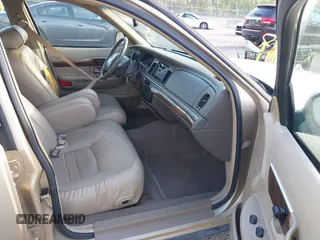 1999 Mercury Grand Marquis LS z VIN 2MEFM75W1XX703878, wystawiony jako IAAI lot #42074187 z przebiegiem 56 962 mil mil oraz . Historia ofert i sprzedaży dostępna na DreamBid. Obrazek 5.