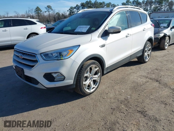 2019 Ford Escape Titanium with VIN 1FMCU9J91KUB21842, listed as a IAAI auction lot 41632210 with 104,900 mi miles. Bid and sale history available at carsss.com. Image 17.