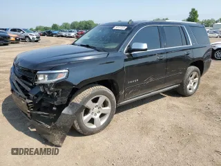 2015 Chevrolet Tahoe LTZ with VIN 1GNSKCKC8FR117736, listed as a Copart auction lot 59197205 with 151,220 mi miles and Clean title. Bid and sale history available at DreamBid. Image 1.