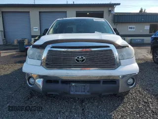 2011 Toyota Tundra 4WD Truck with VIN 5TFDM5F18BX021093, listed as a Copart auction lot 70346484 with 205,452 mi miles and Salvage Title. Bid and sale history available at carsss.com. Image 5.
