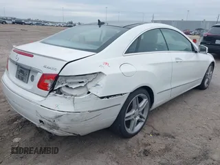 2013 Mercedes-Benz E-Class E 350 with VIN WDDKJ8JB8DF214490, listed as a IAAI auction lot 41500949 with 156,566 mi miles. Bid and sale history available at carsss.com. Image 4.