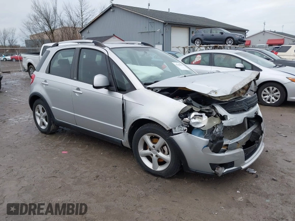 2007 Suzuki SX4 Man Touring Pkg AWD with VIN JS2YB417475102405, listed as a IAAI auction lot 41106931 with 170,315 mi miles. Bid and sale history available at carsss.com. Image 1.