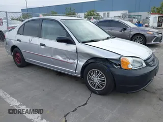 2001 Honda Civic LX with VIN 1HGES15511L023007, listed as a IAAI auction lot 41577660 with 288,408 mi miles. Bid and sale history available at carsss.com. Image 1.