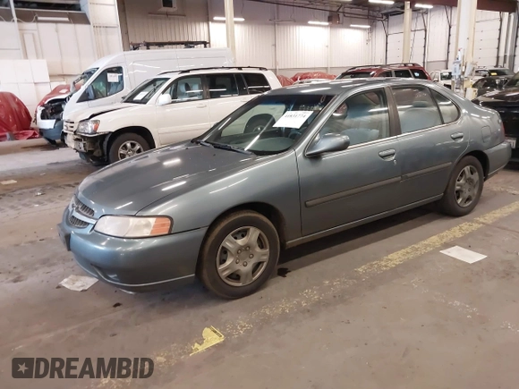 2000 Nissan Altima XE with VIN 1N4DL01D4YC185986, listed as a IAAI auction lot 41831774 with 217,044 mi miles. Bid and sale history available at carsss.com. Image 18.