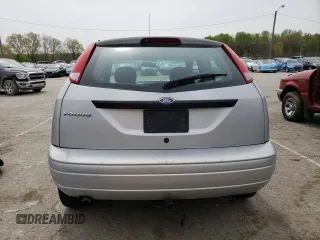 2007 Ford Focus S z VIN 1FAFP31N67W299458, wystawiony jako Copart lot #52703425 z przebiegiem 231 936 mil mil oraz Szkody całkowita. Historia ofert i sprzedaży dostępna na DreamBid. Obrazek 6.