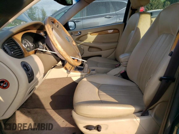 2004 Jaguar X-Type z VIN SAJEA51C04WD65097, wystawiony jako Copart lot #53825295 z przebiegiem 58 270 mil mil oraz Szkoda całkowita • Salvage title. Historia ofert i sprzedaży dostępna na DreamBid. Obrazek 7.